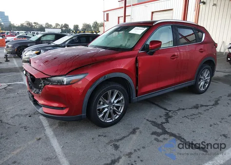 2021 Mazda Cx-5 Grand Touring z USA, uszkodzony, nr VIN JM3KFADM4M0402675